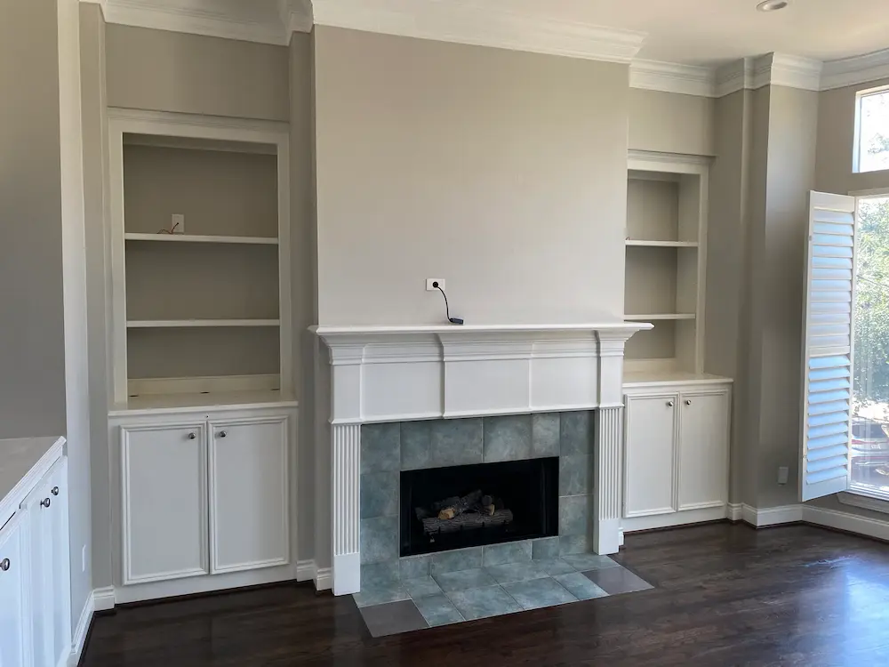 Deep cleaned fireplace without debris in sight.